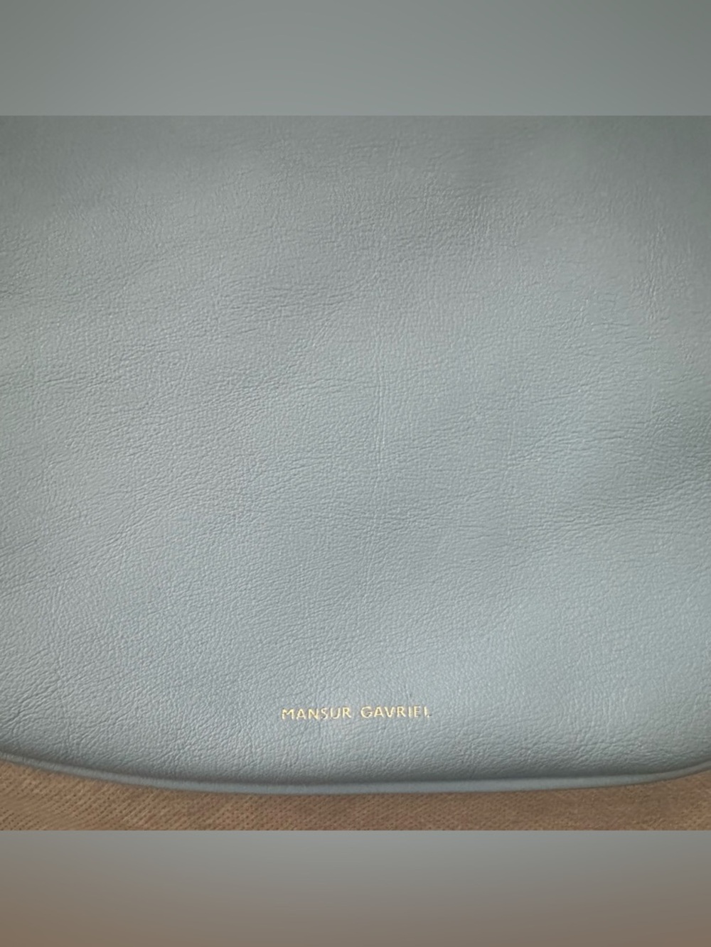 Mansur Gavriel leather light blue mini handbag.